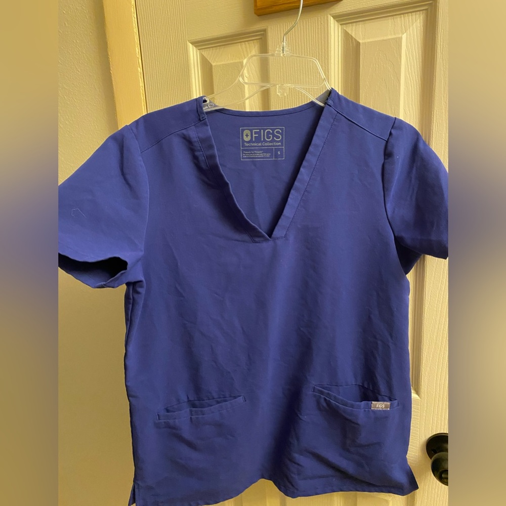 Winning blue Figs top
